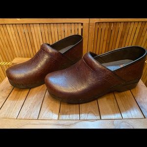 Dansko XP floral tooled clogs
